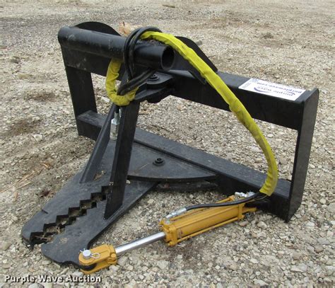 skid steer extreme duty tree puller|tractor mounted tree puller.